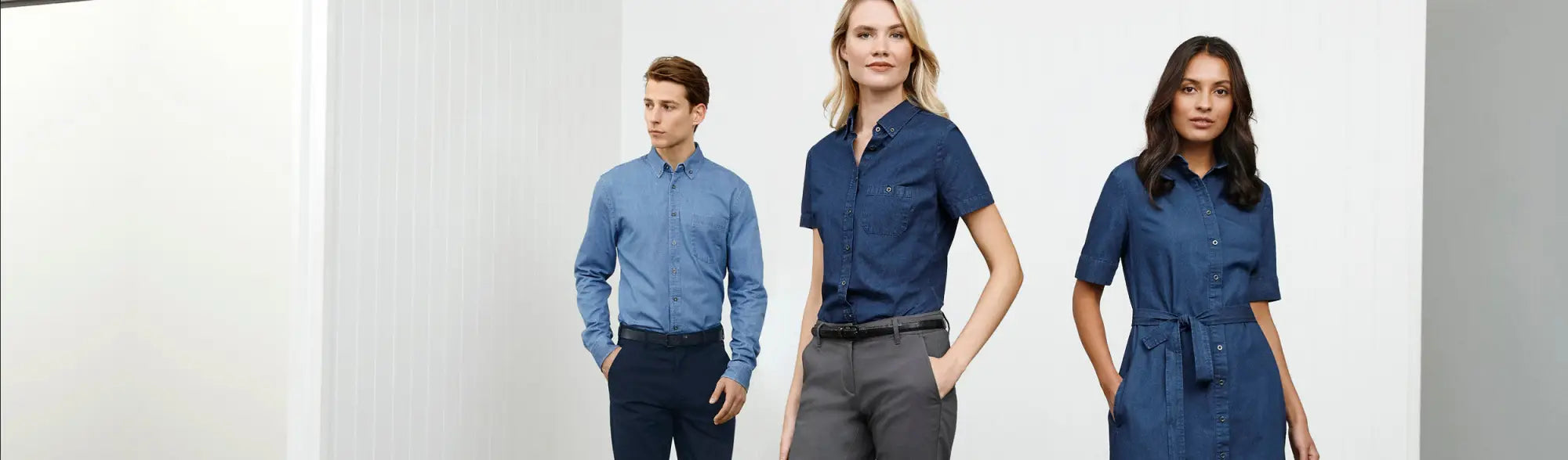 Three people in blue clothing representing the Small Business Bundle collection