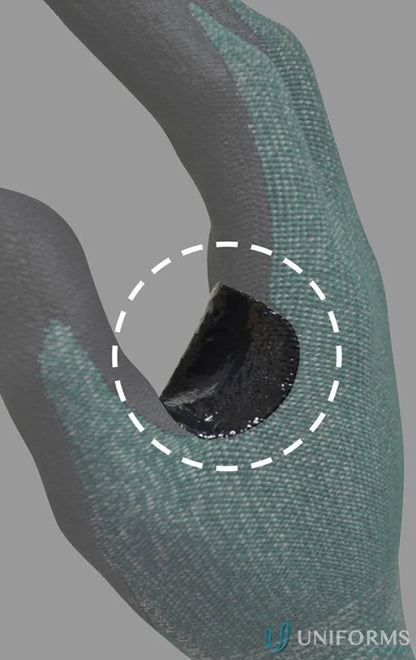 Gloved hand holding dark semi-circular cut c nitrile glove for uniforms safety