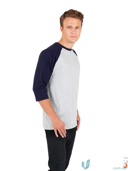 Man wearing a 3Qtr Raglan Tee from our sizing guide size collection