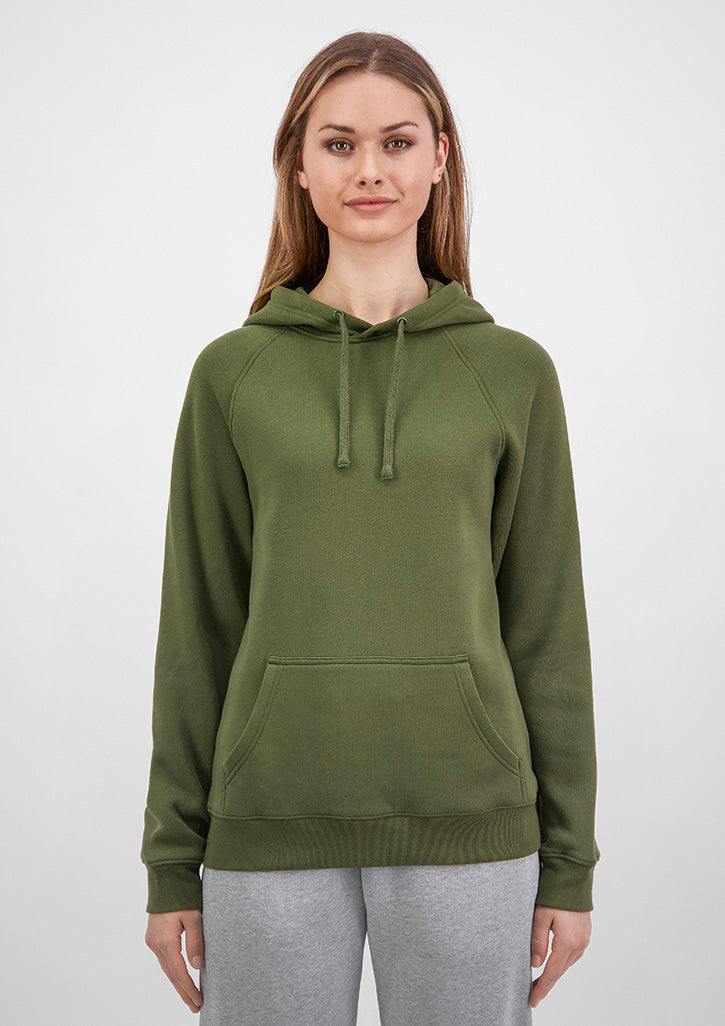 Woman wearing a green hoodie on a white background