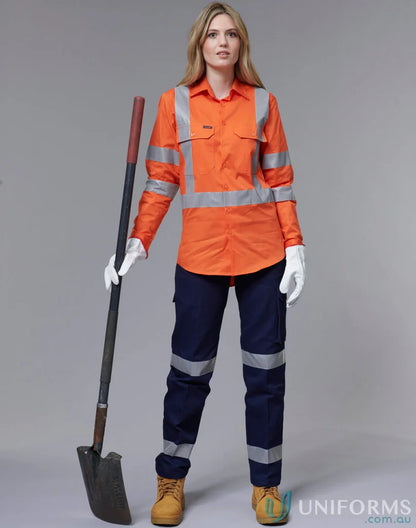 Woman in workwear with shovel wearing AIW Safety Vest with Shoulder Tapes, a sw43 safety vest
