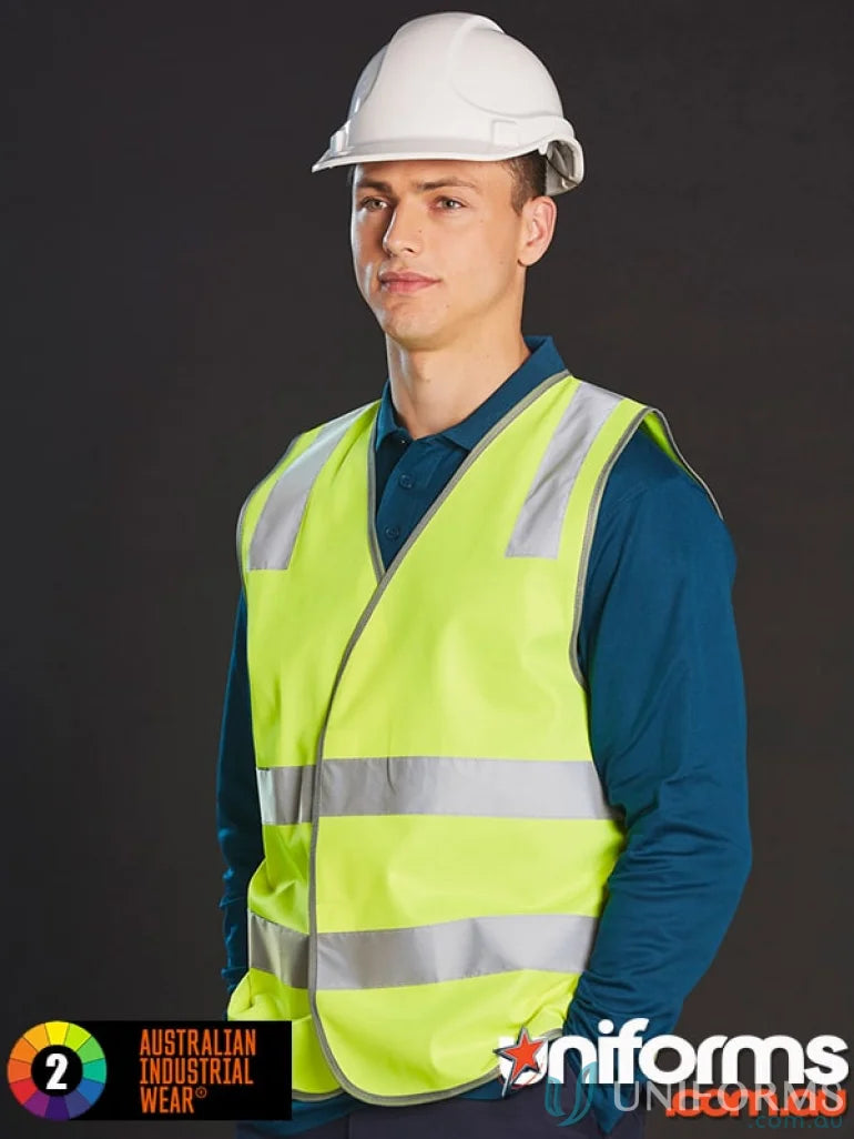 Man wearing a white hard hat and AIW Safety Vest with Shoulder Tapes for high visibility