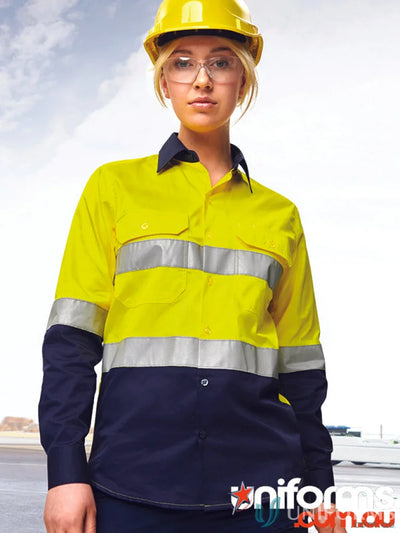 Woman in AIW Unisex HiVis Cool Breeze LS Shirt and hard hat showing safety and style