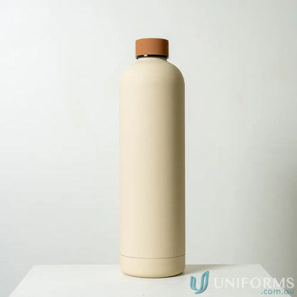 Beige stainless steel Allegra 1L insulated water bottle with brown lid fits car cup holders