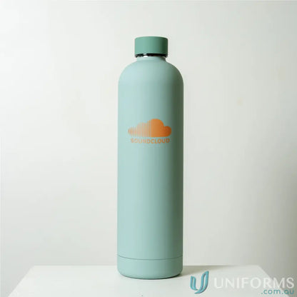 Mint-colored stainless steel Allegra 1L insulated bottle fits in car cup holders
