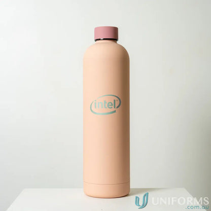 Peach-colored Allegra 1L stainless steel insulated bottle with pink lid for car cup holders
