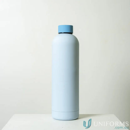 Light blue stainless steel water bottle with double-wall vacuum insulation for uniforms