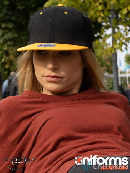 Black and yellow flat-brimmed cap from American Twill Snapback, perfect for work uniforms or casual uniforms