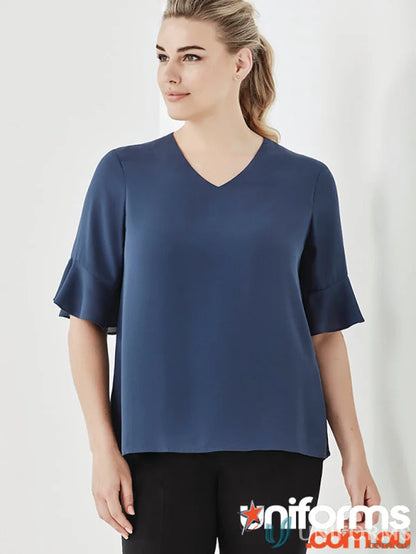 Women’s blue V-neck blouse with fluted sleeves from Collection Aria Fluted, perfect functional workwear