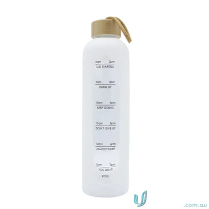 White borosilicate glass water bottle with time markings and silicone sleeve