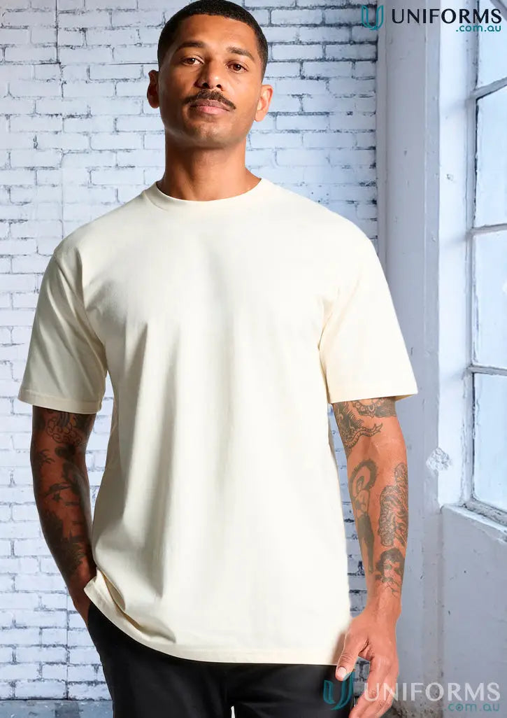 Cream-colored AS Classic Tee, relaxed fit shirt made from comfy combed cotton