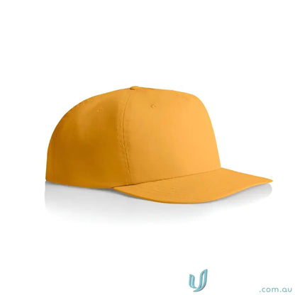 Yellow surf cap made of recycled nylon with flat brim and plastic snapback