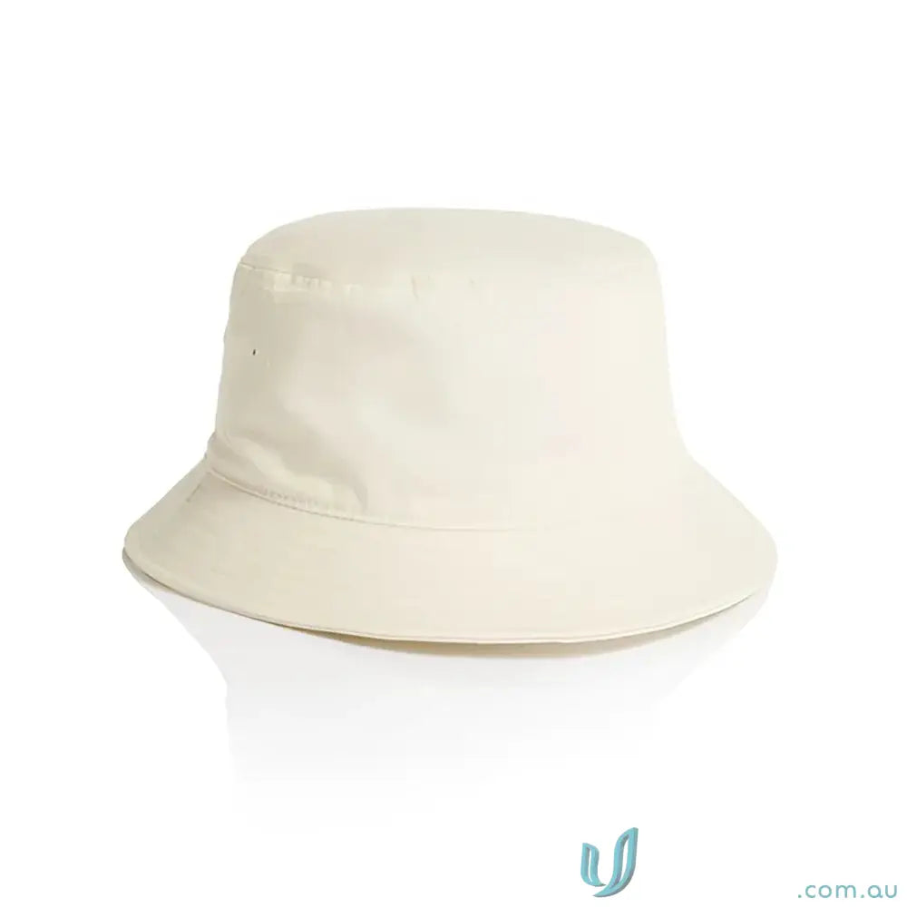 Cream-colored bucket hat with reinforced brim, ventilation eyelets, lightweight cotton style