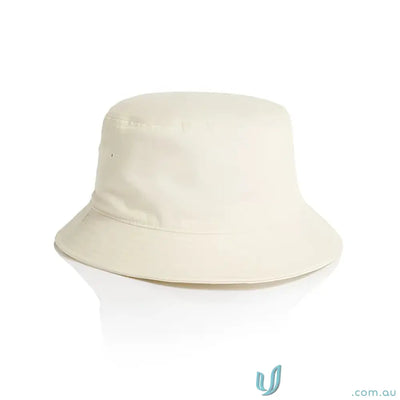 Cream-colored bucket hat with reinforced brim, ventilation eyelets, lightweight cotton style