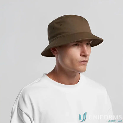 Man wearing AS Colour 1117 olive green bucket hat with reinforced brim and lightweight feel