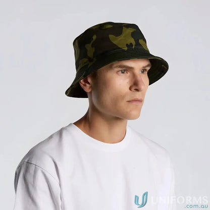 Man wearing a stylish camo bucket hat and white t-shirt perfect for outdoor looks
