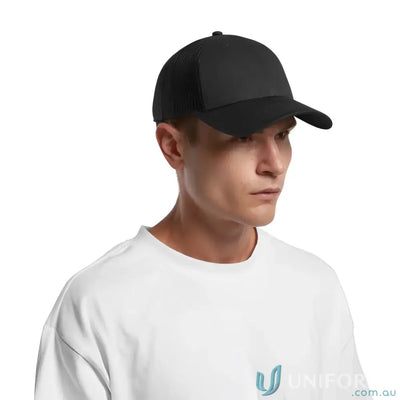 Man wearing black Access Active Cap with mesh back and white t-shirt