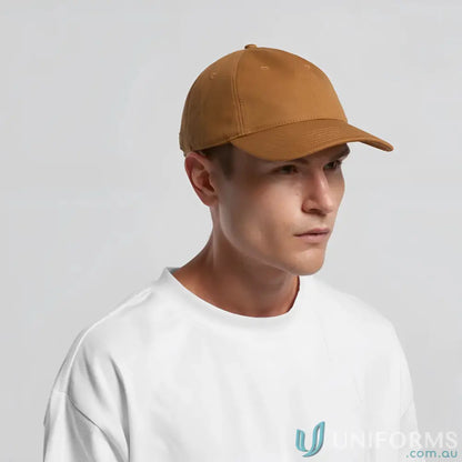 Man wearing a white t-shirt and brown cotton canvas Access Canvas Cap 1131
