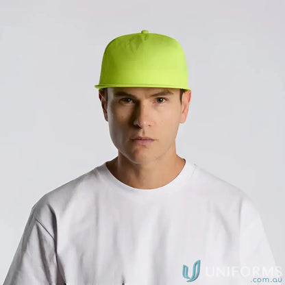 Man wearing neon green recycled nylon Colour Surf Safety Cap and white T-shirt
