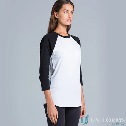 Woman wearing a stylish black and white baseball tee, perfect for workwear or uniforms
