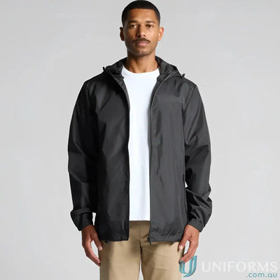 Men’s black section zip jacket with white t-shirt and tan pants for a casual look