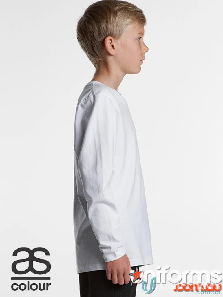 Boy in plain white staple LS Tee from AS Youth Staple collection, perfect for youth uniforms