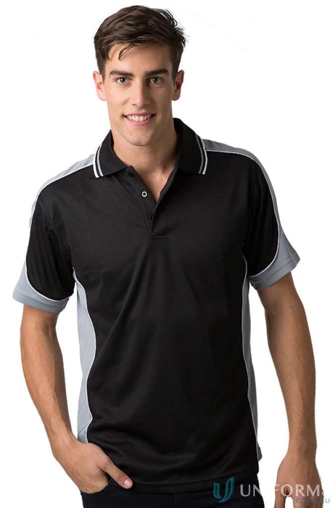 Man in Auburn Polo with sewn-on pocket, designed for moisture management comfort
