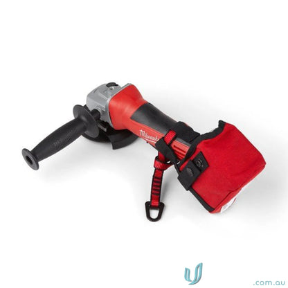 Red and gray angle grinder with safety cover in gripps® Battery Catch Holster made of reinforced nylon