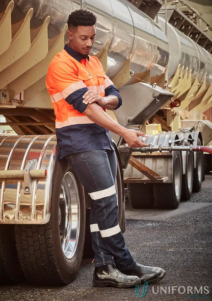 Man in Bio Motion Taped stretch workwear jeans and high-vis work shirt