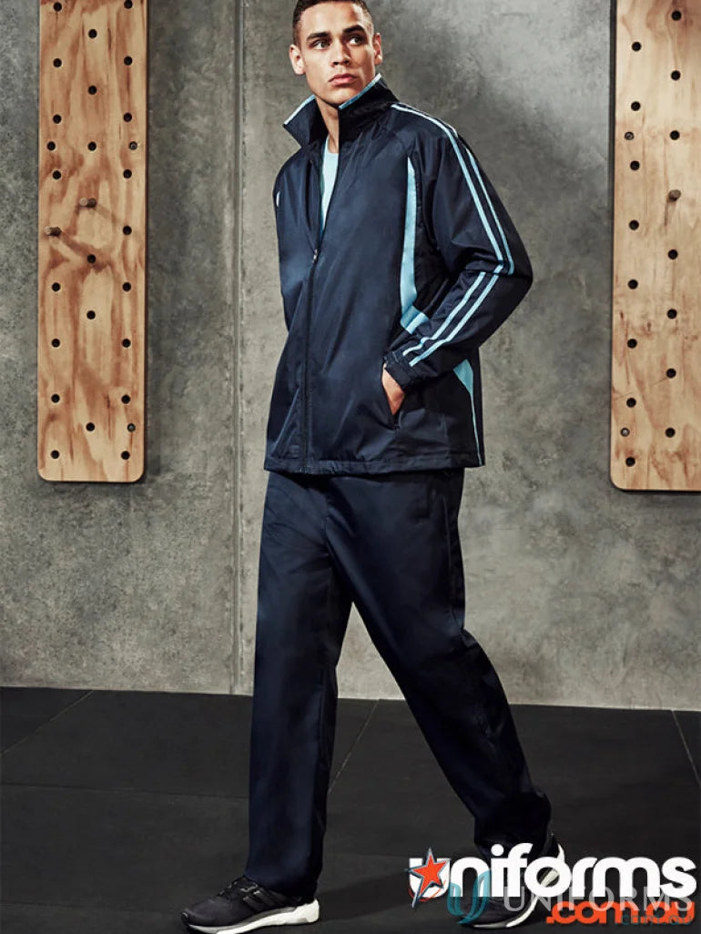 Man wearing Biz Collection Unisex Flash Pant TP3160 with elastic waistband and striped accents