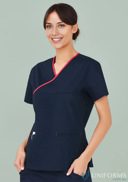 Navy blue women’s contrast scrub top with crossover design and natural stretch from BizCare