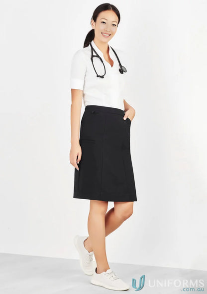 Woman in medical attire wearing Bizcare Comfort Waist Cargo Skirt for women’s comfort