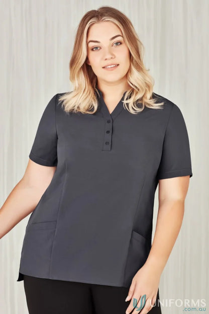 Woman wearing Bizcare Florence Plain Tunic in gray showcasing women’s Florence plain style