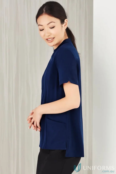 Woman in navy top wearing Bizcare Florence Plain Tunic, women’s Florence plain style CS949LS