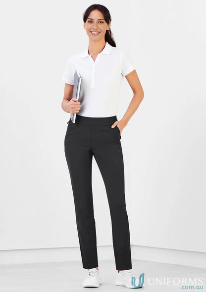 Bizcare women’s Jane Stretch Pant: woman in white polo and black pants, casual style