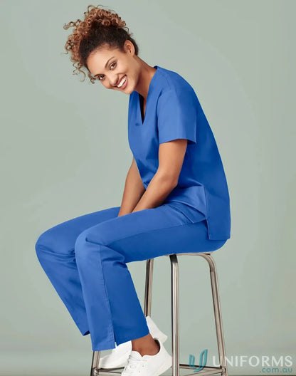 Blue medical scrubs for women in classic scrub bootleg style with soft-touch fabric