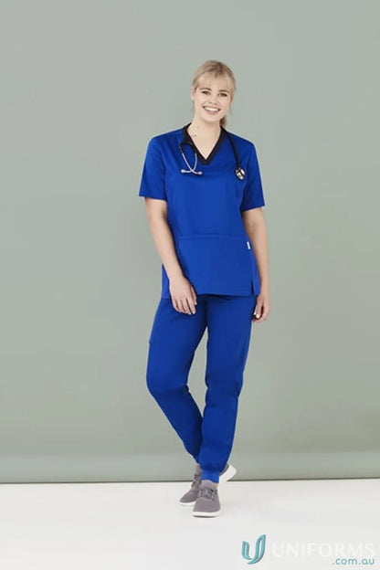 Blue Bizcare Women’s Riley Stretch Scrub Top with stethoscope for medical pros