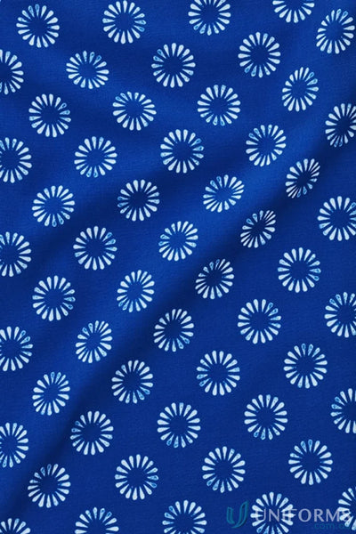 Blue fabric with florence daisy print for Bizcare Stretch Daisy Print SS Shirt CS948LS, effortless style