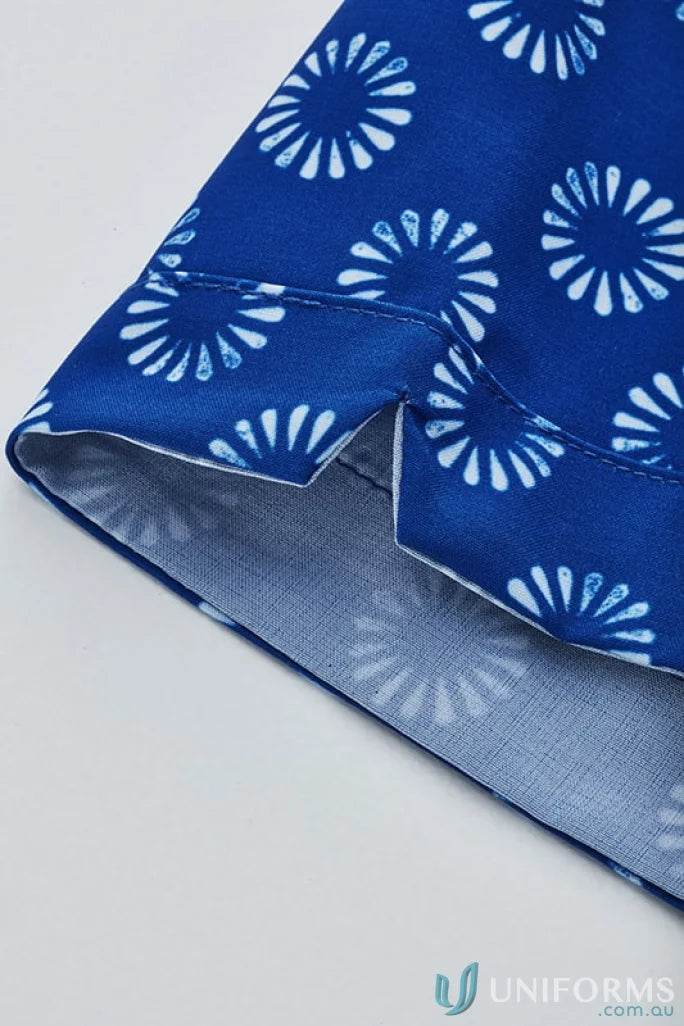 Blue fabric with florence daisy print and notched hem from Bizcare Stretch Daisy Print SS Shirt for effortless style