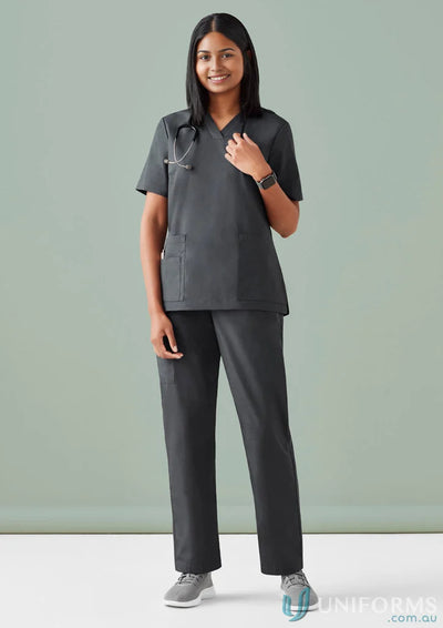 Gray BizCare Women’s Tokyo Scrub Pant with CSP143LL elastic waistband tabletop