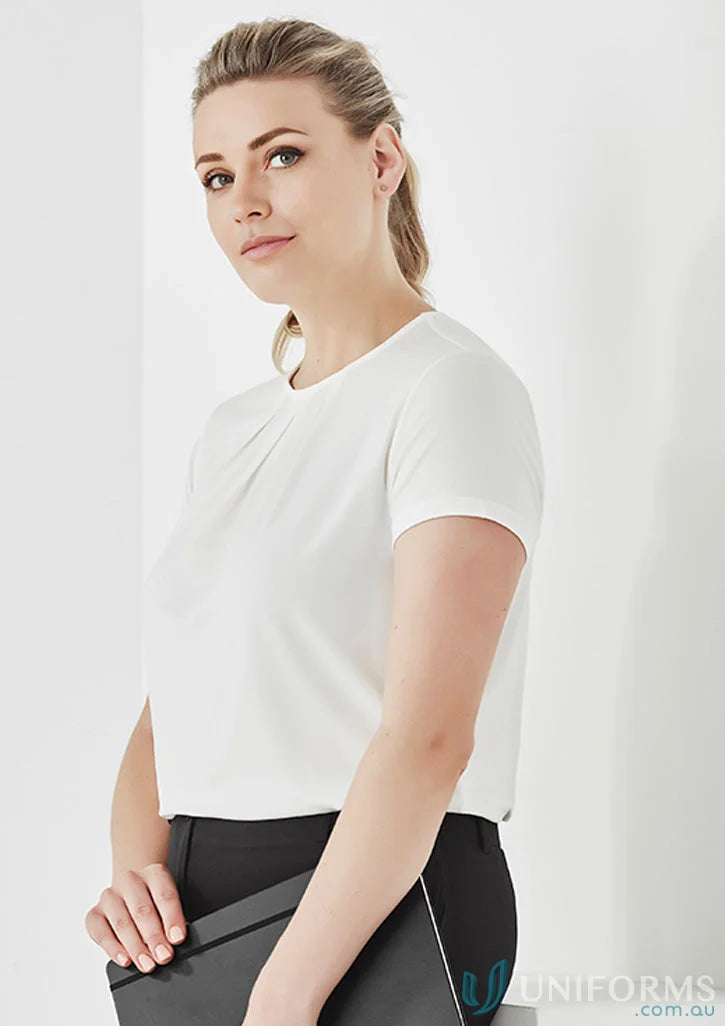 Woman in white blouse from Blaise Womens Top in luxe jersey knit, perfect for women’s Blaise style