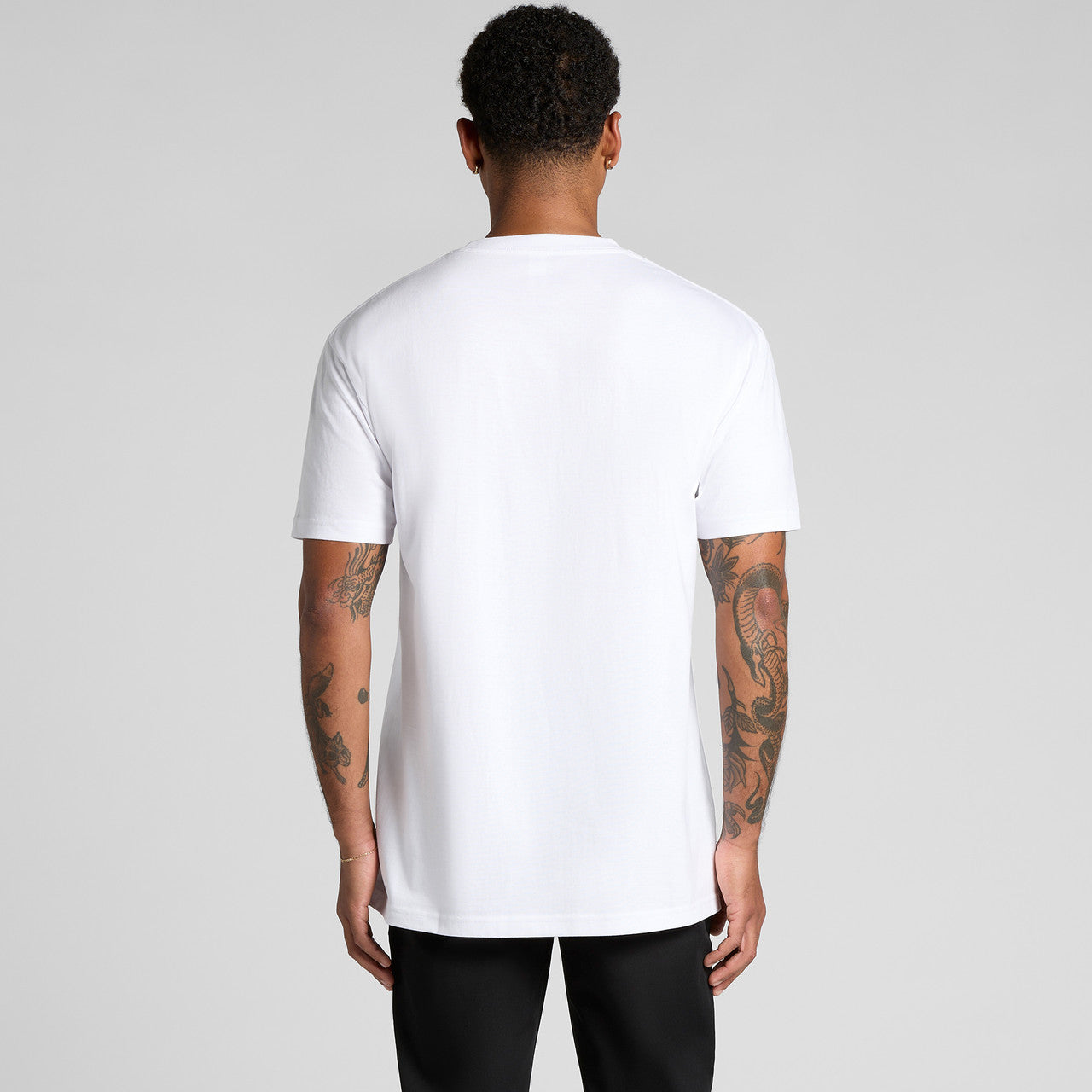 White nike t-shirt with swoosh logo on back.