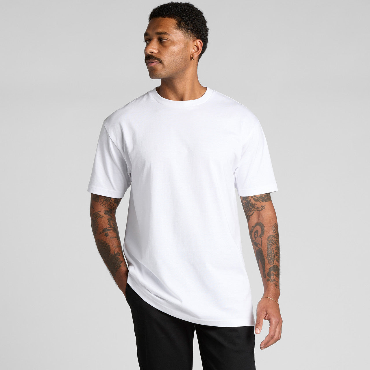 White crew neck t-shirt with short sleeves and a relaxed fit.