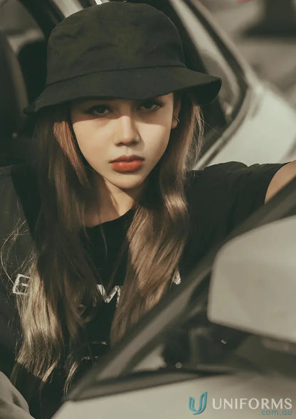 Woman wearing a winning spirit bucket hat made of heavy brushed cotton, ch29 soft washed