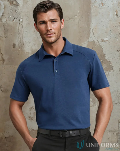 Man in blue men’s Byron polo shirt from Biz Collection Byron with tailored fit