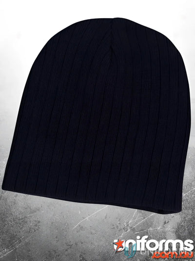 Dark blue cable knit beanie from Winning Spirit Cable to stay warm and stylish