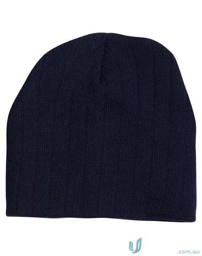 Navy blue cable knit beanie from Winning Spirit Cable collection with fleece headband