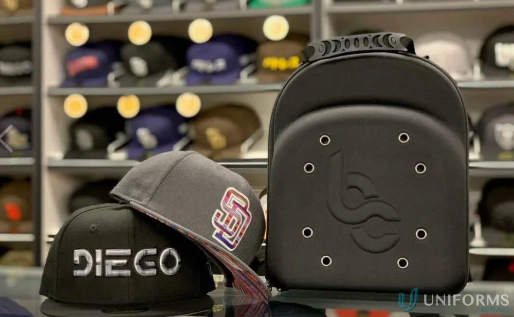 Cap carrier with baseball caps in a 6pk cap carrier for easy transport and storage