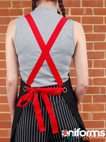 Black apron with red straps from the Spirit Changeable Apron line featuring changeable apron straps