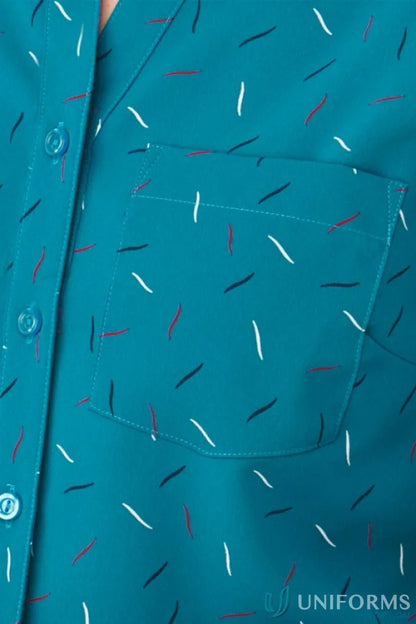 Teal City Stretch Spot Tunic with confetti pattern and chest pocket